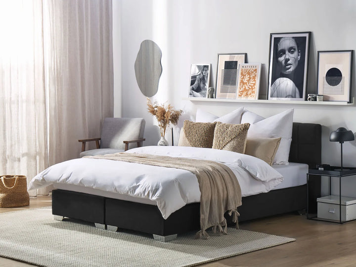 Upholstered divan bed in black linen fabric