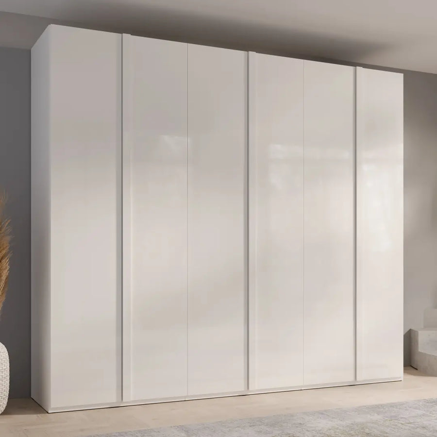White wardrobe with sliding doors in a room setting