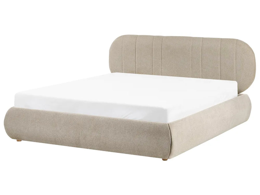 Beige upholstered bed with white mattress on a white background