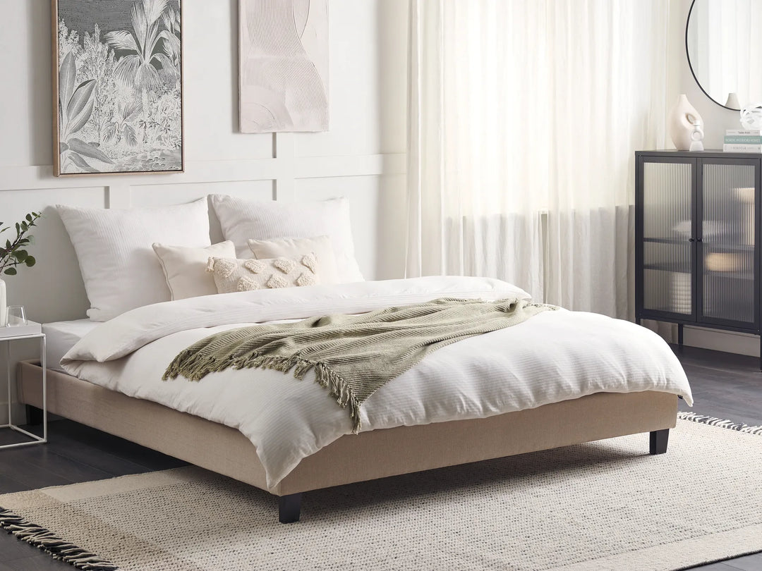 Minimalist upholstered bed frame with slatted base