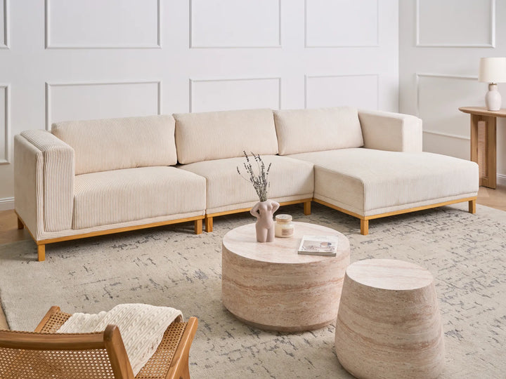 Left hand light beige corduroy corner sofa with wooden legs