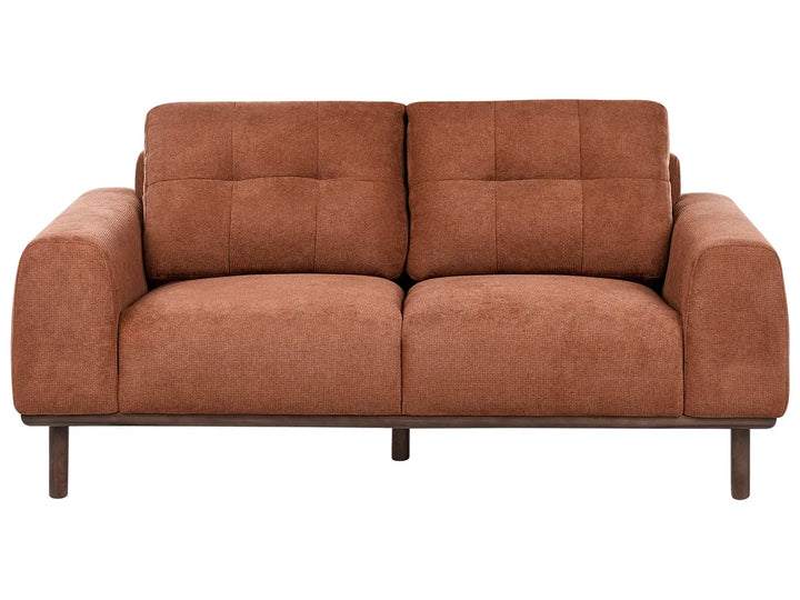Brown sofa with wooden legs on a white background