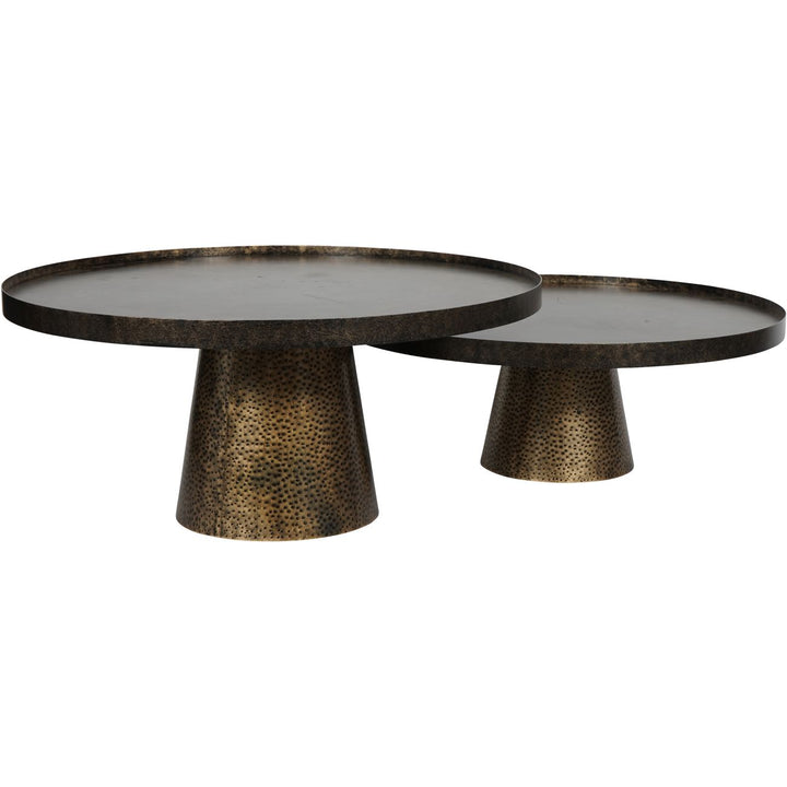 Two round metal tables with textured bases on a white background