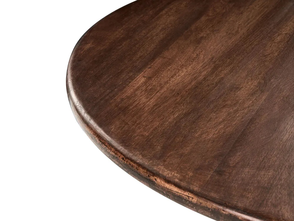 Close-up of a dark wooden table surface on a white background
