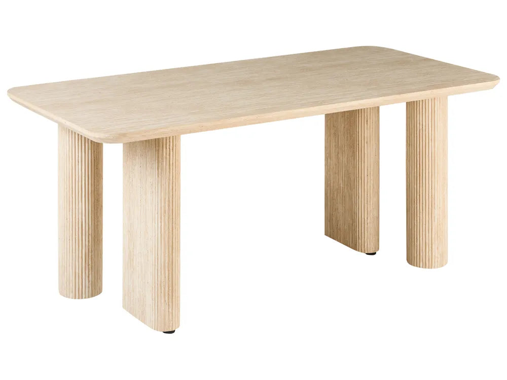 Light wood dining table with fluted legs on a white background