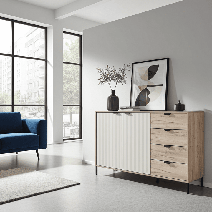 Modern living room with a blue sofa, wooden sideboard, and abstract art.