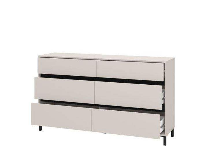 Beige dresser with multiple drawers on a white background