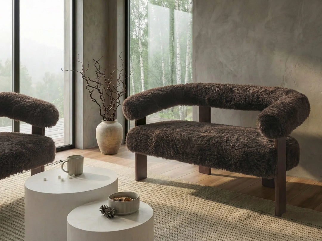 Modern living room with brown textured armchairs and a white coffee table.