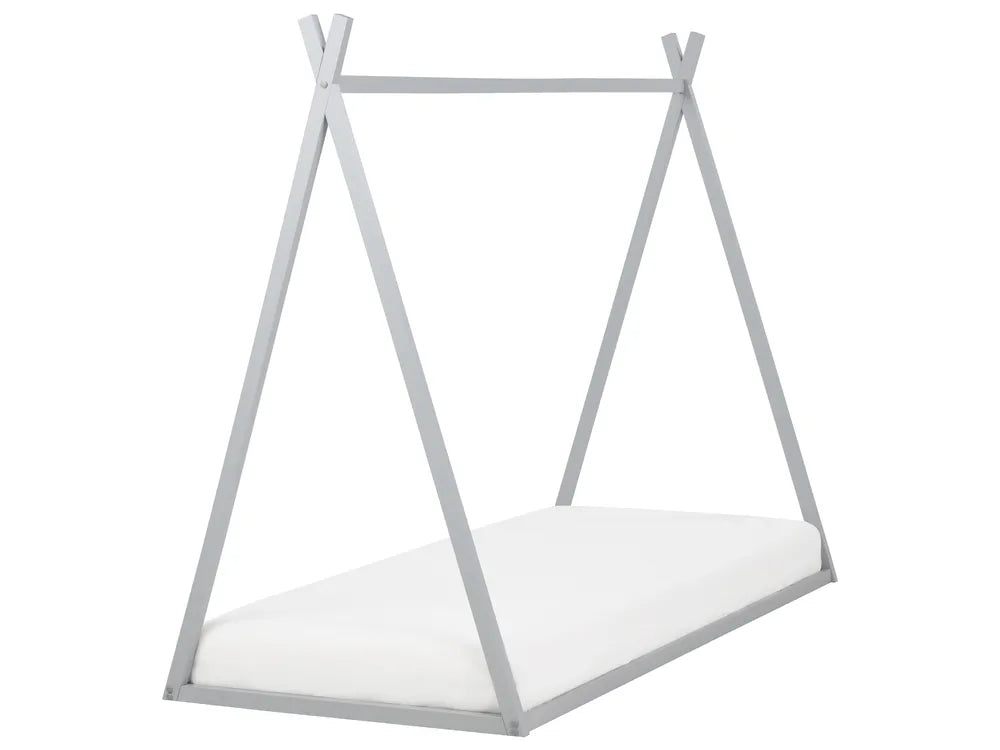 White hanging shelf with a geometric design on a white background
