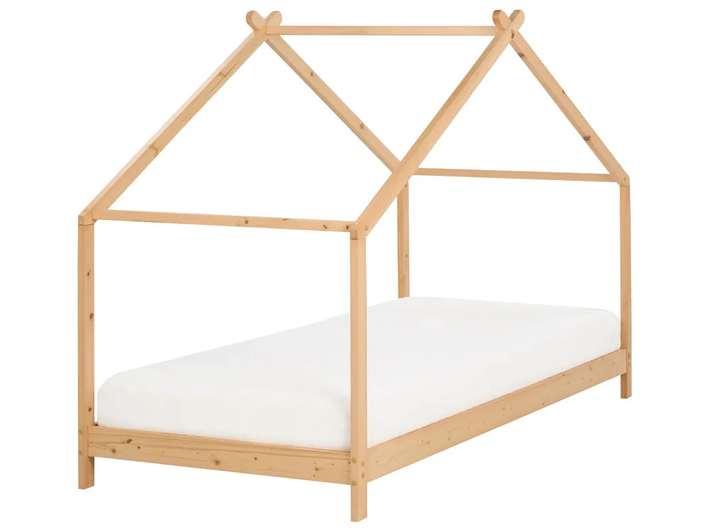 Wooden children's bed with a white mattress on a white background