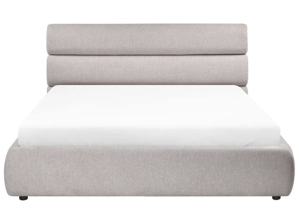 Gray upholstered bed with white mattress on a white background