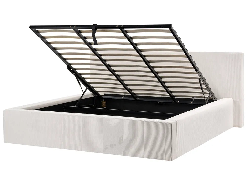 White bed frame with black metal headboard on a white background