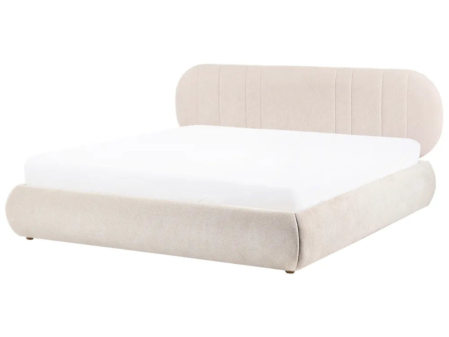 Beige upholstered bed with white mattress on a white background