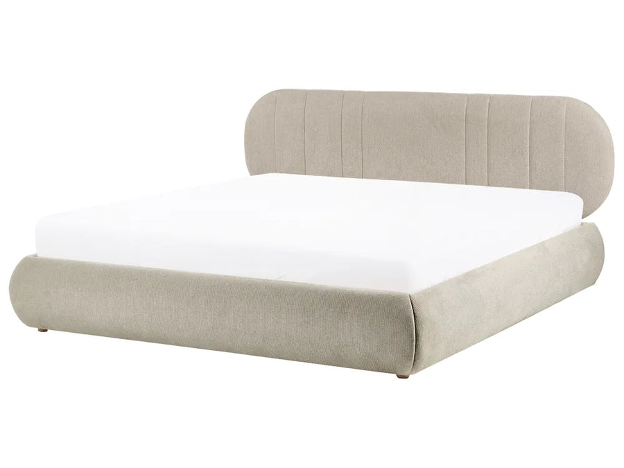Beige upholstered bed with white mattress on a white background