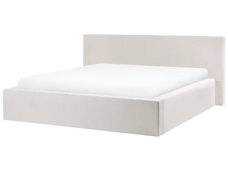 White bed frame with mattress on a white background