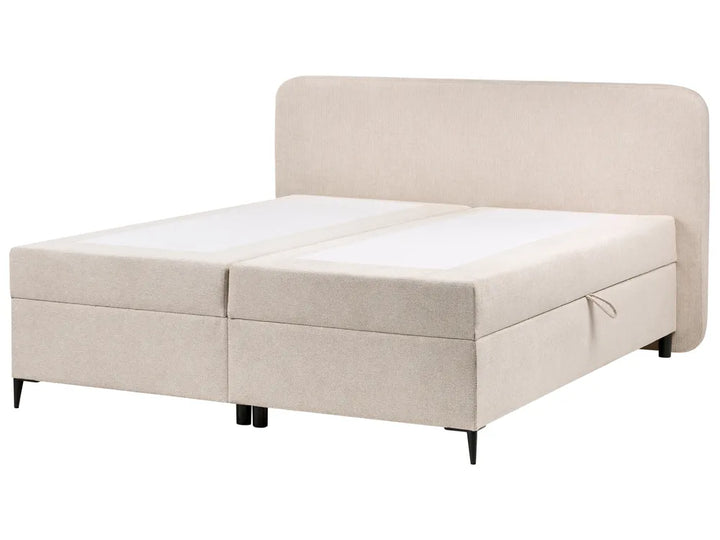 Beige upholstered bed with storage drawers on a white background