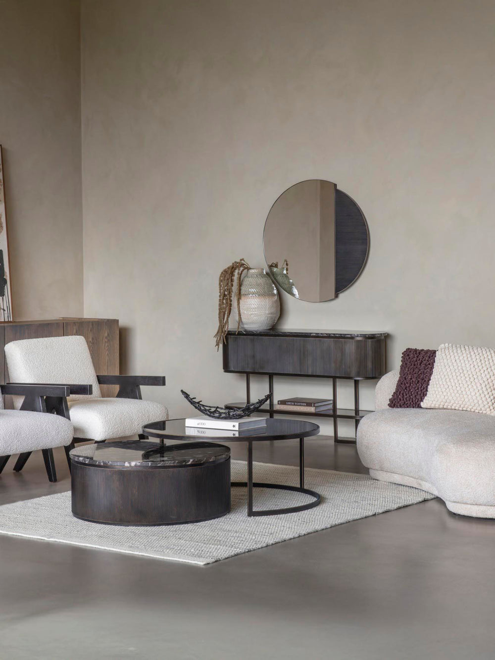 Modern living room with gray walls, furniture, and decor.