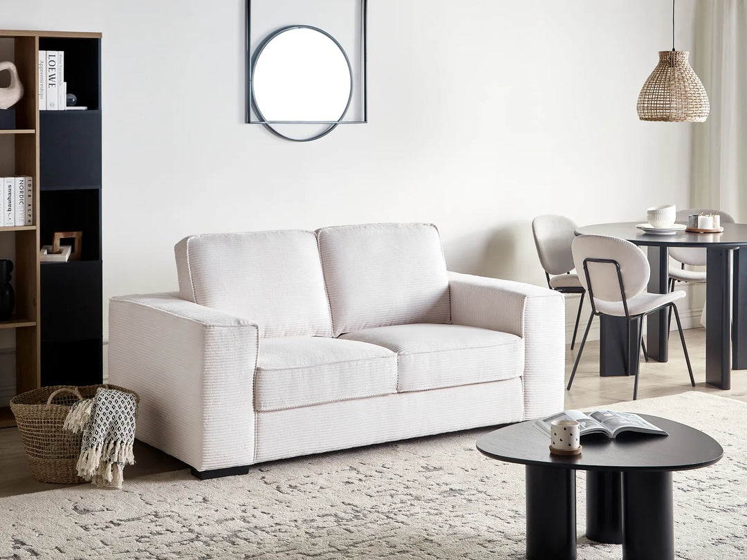 2 seater white cord sofa with minimalist legs