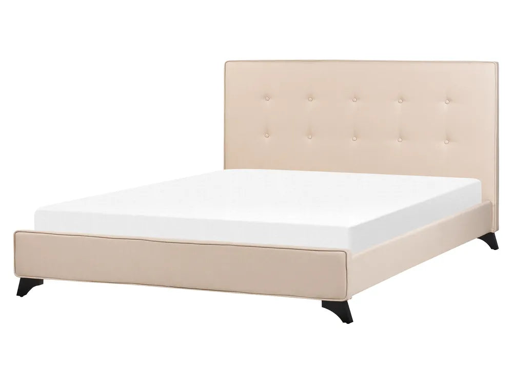 Beige upholstered bed with white mattress on a white background