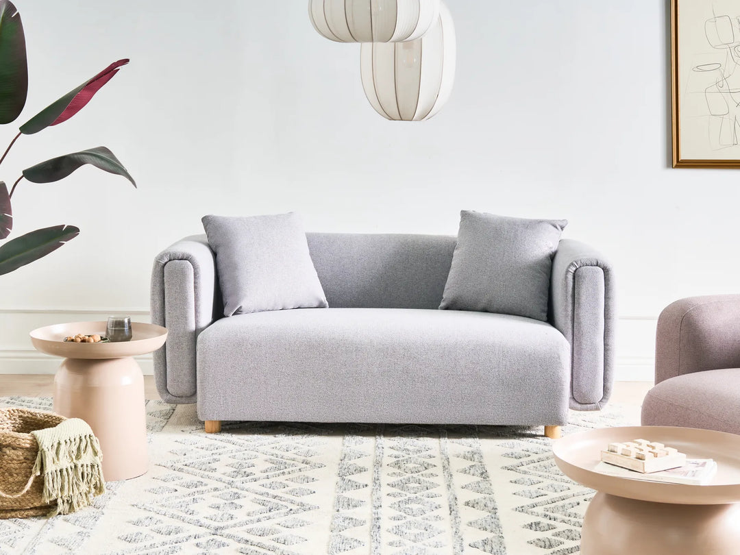modern grey 2 seater sofa with soft upholstery and wooden frame