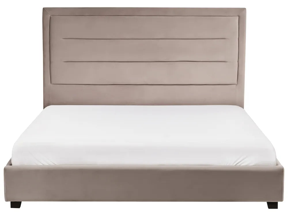 Beige upholstered bed with white mattress on a white background