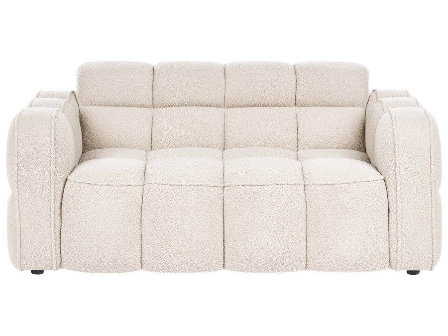 Beige sofa on a white background