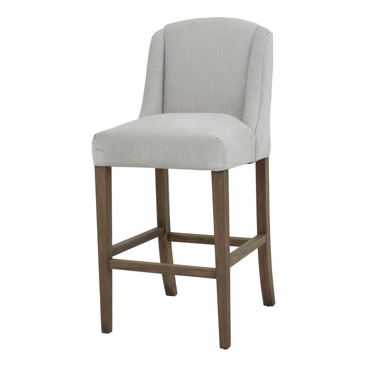 Gray upholstered bar stool with wooden legs on a white background