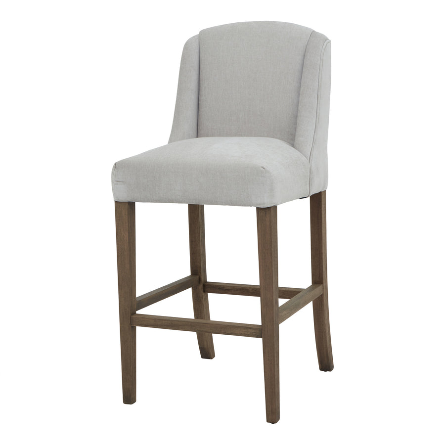 Gray upholstered bar stool with wooden legs on a white background