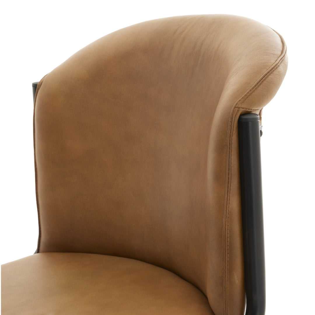 Modern leather dining chair with curved backrest