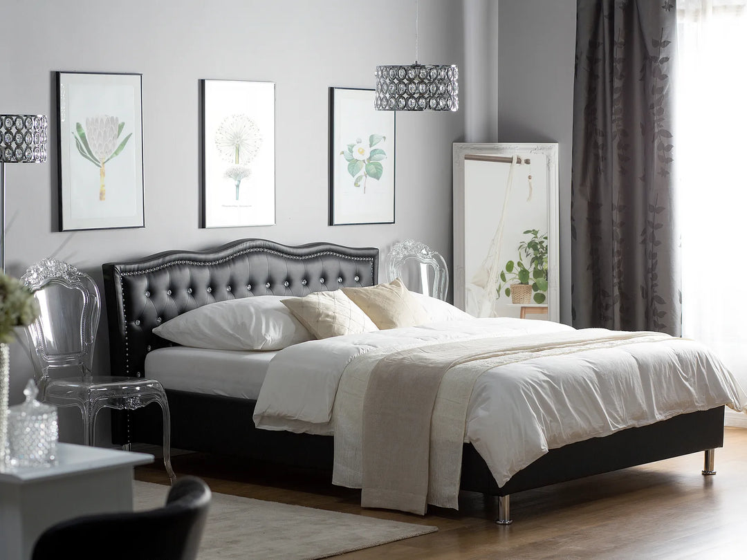 Neatly made bed in a bedroom with decorative elements.