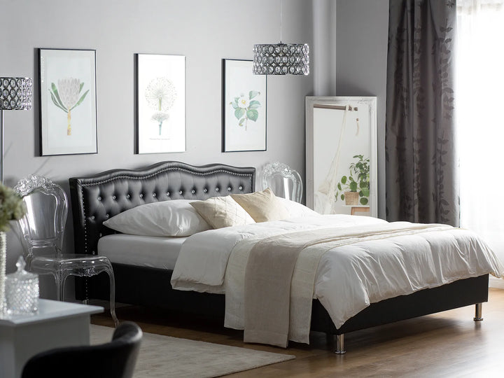 Neatly made bed in a bedroom with decorative elements.