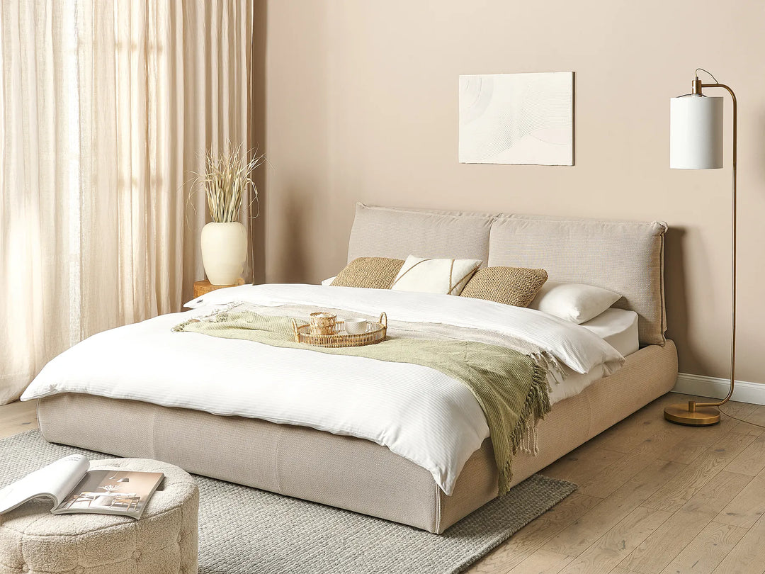 Super King waterbed with soft beige corduroy upholstery