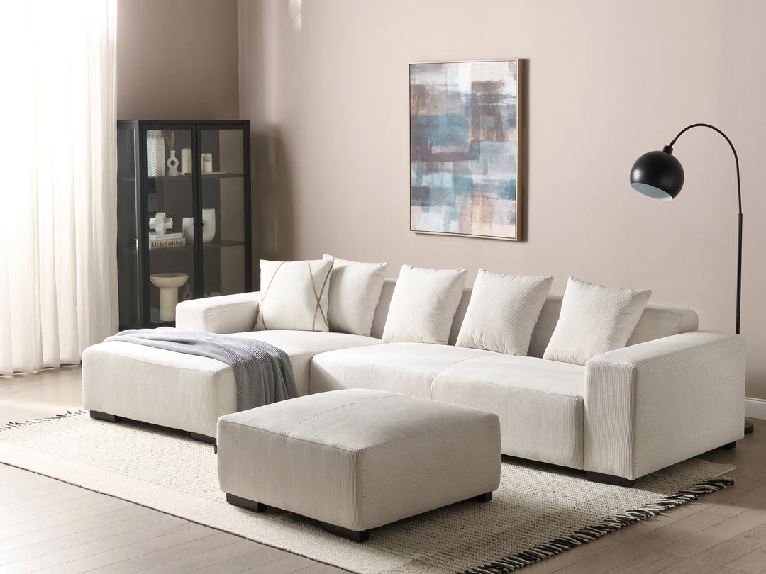 Right hand off-white jumbo cord corner sofa with ottoman