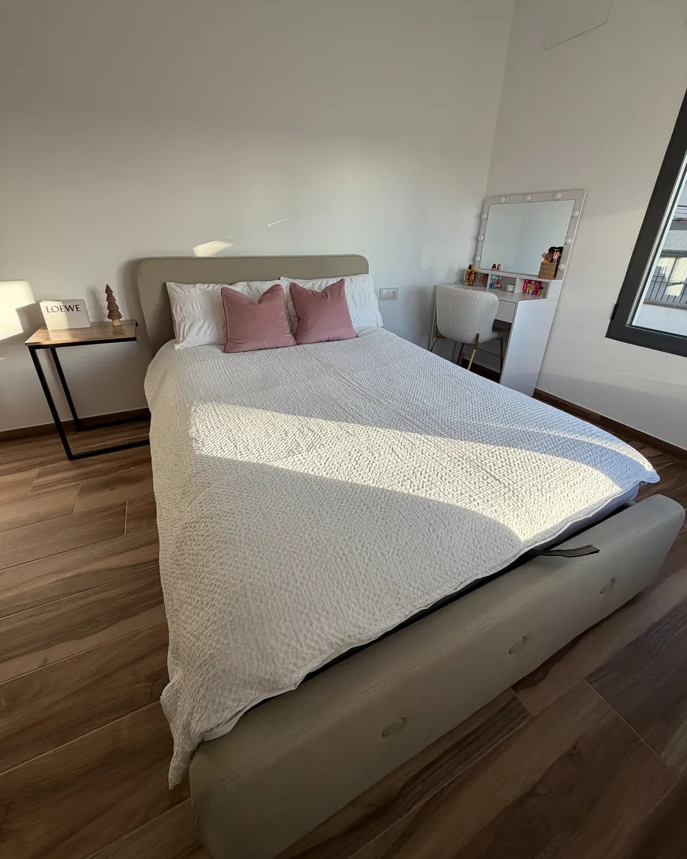 Modern beige storage bed with linen upholstery