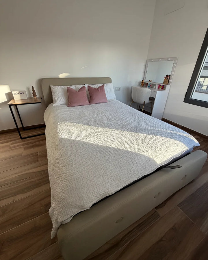 Modern beige storage bed with linen upholstery