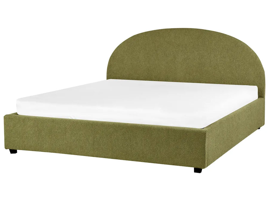 Green upholstered bed with white mattress on a white background