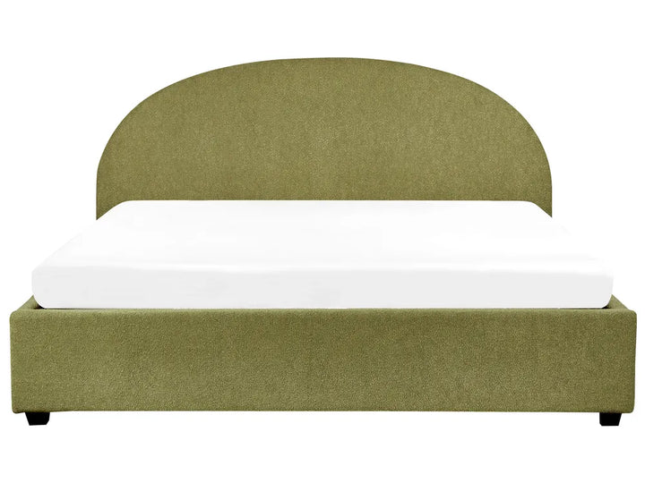 Green upholstered bed with white mattress on a white background