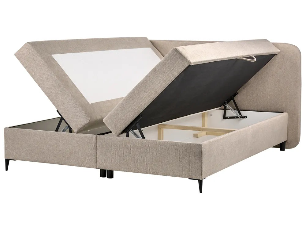 Beige upholstered bed with storage compartment on a white background