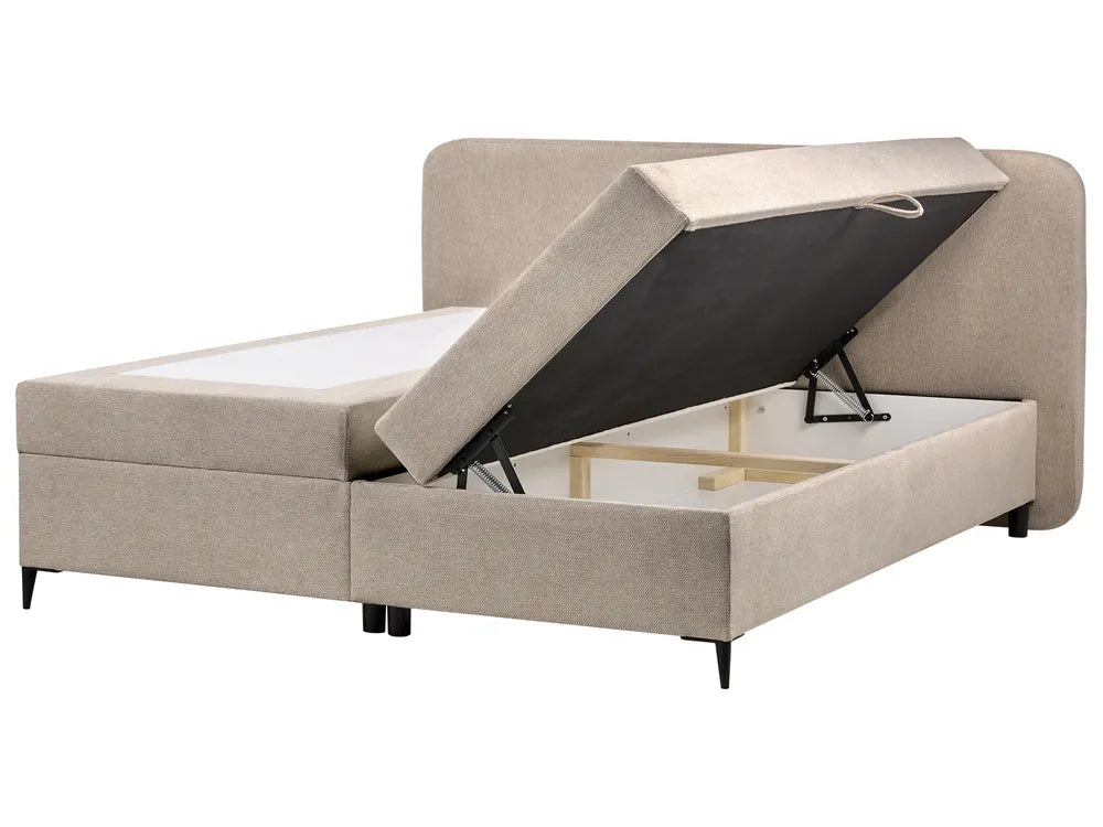 Beige upholstered bed with storage compartment on a white background