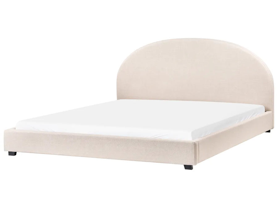 Beige upholstered bed with white mattress on a white background