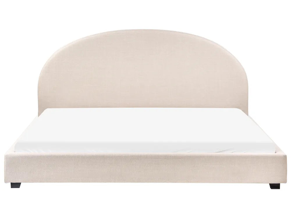Beige upholstered bed with white mattress on a white background