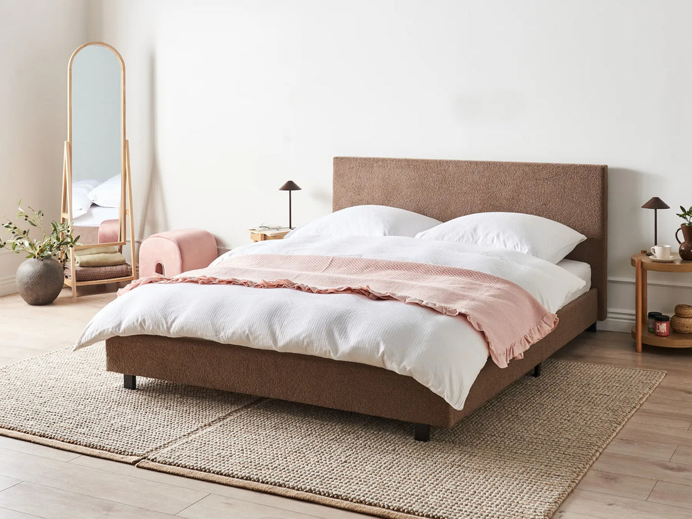 Brown boucle waterbed with upholstered frame