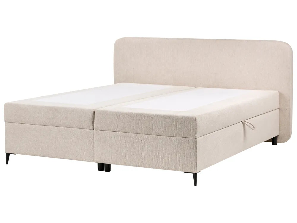 Beige upholstered bed with storage drawers on a white background