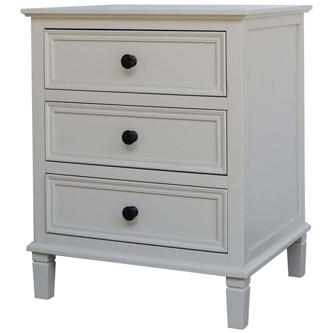White three-drawer nightstand with black knobs on a white background