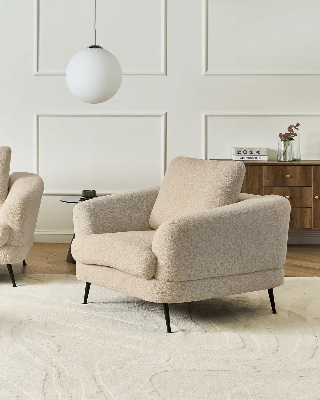 A sophisticated seating solution crafted from premium boucle fabric in a versatile light beige tone.