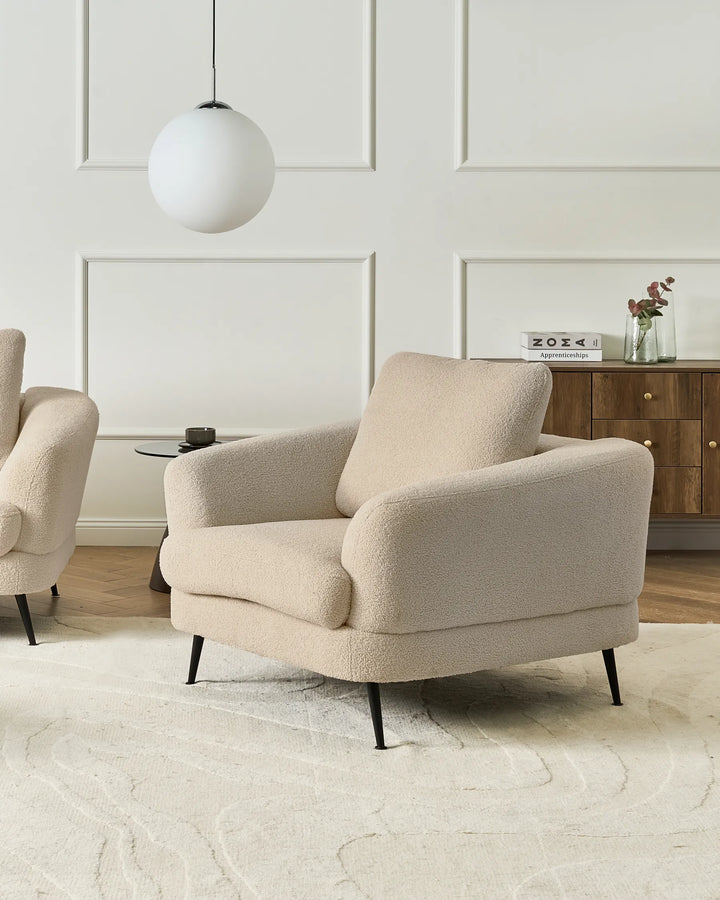 A sophisticated seating solution crafted from premium boucle fabric in a versatile light beige tone.