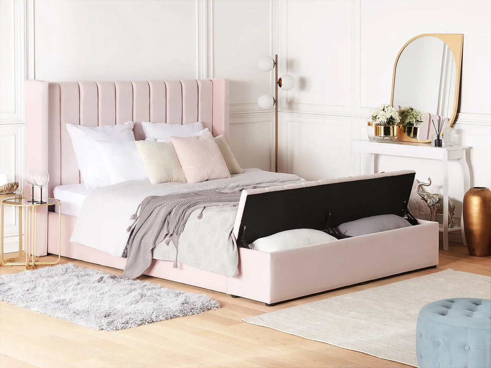 pink velvet bed with winged headboard and bench