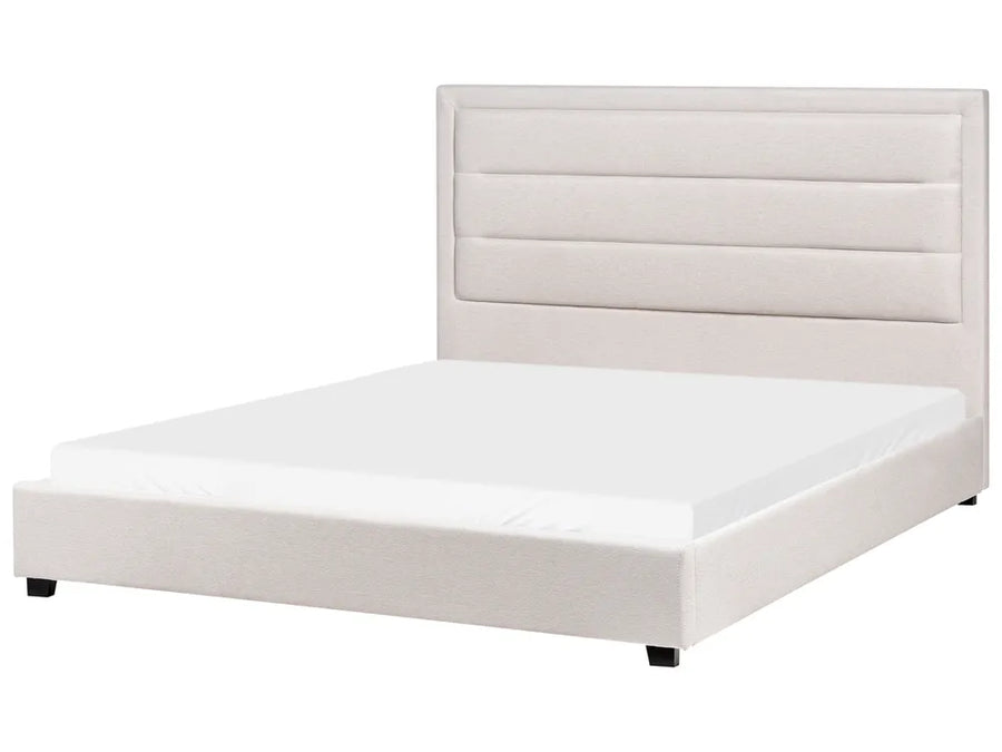 White bed frame with a tufted headboard on a white background