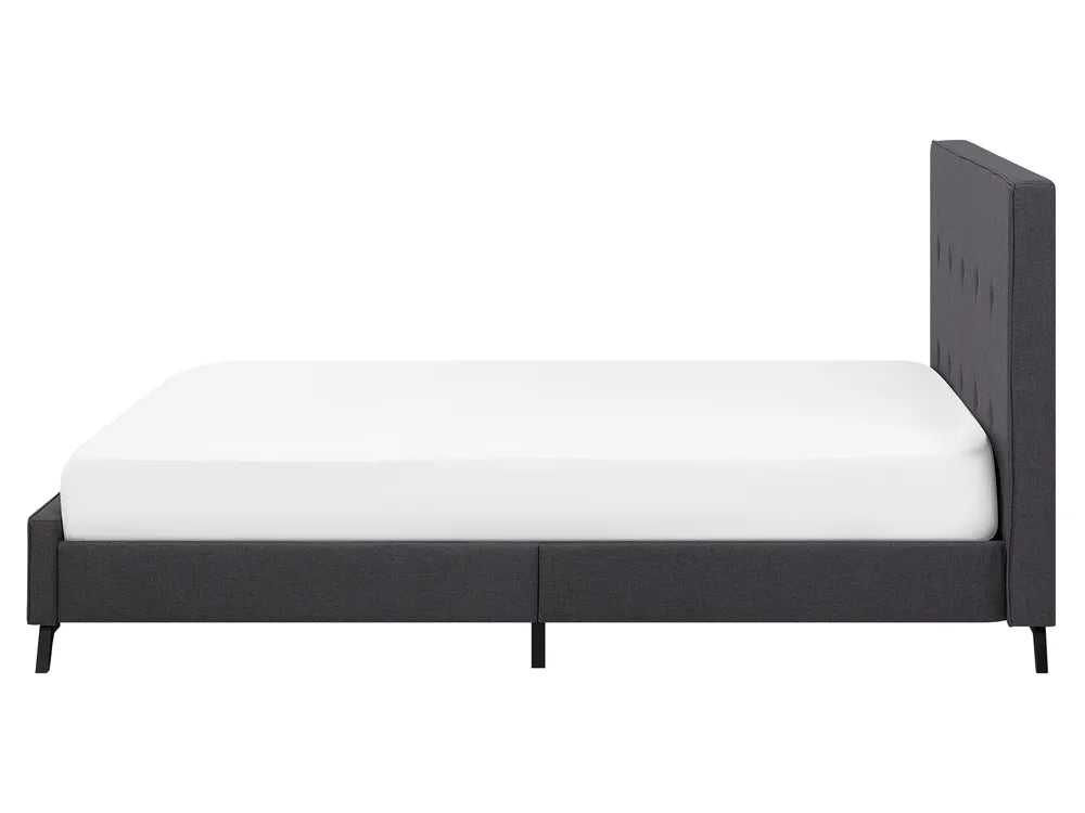 Black bed frame with white mattress on a white background
