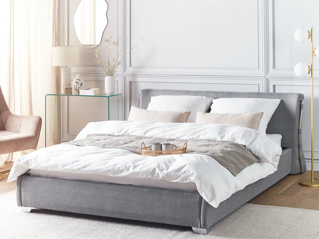 Upholstered waterbed with grey fabric finish